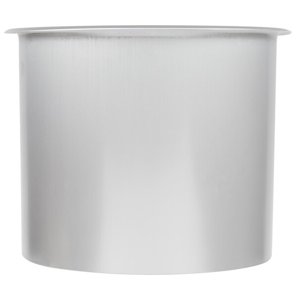 A close-up of a silver round stainless steel Vollrath in-counter trash chute.