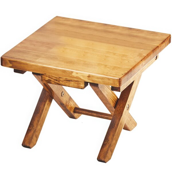 A Cal-Mil Madera folding riser on a wooden table.