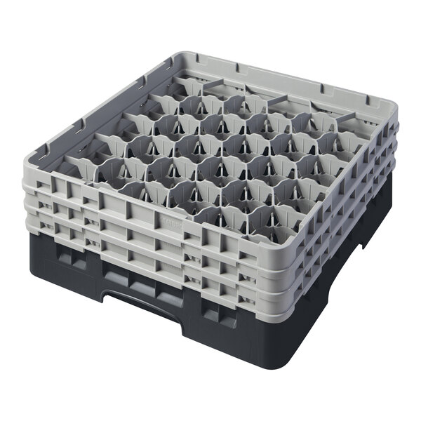 A black plastic Cambro glass rack with extenders.