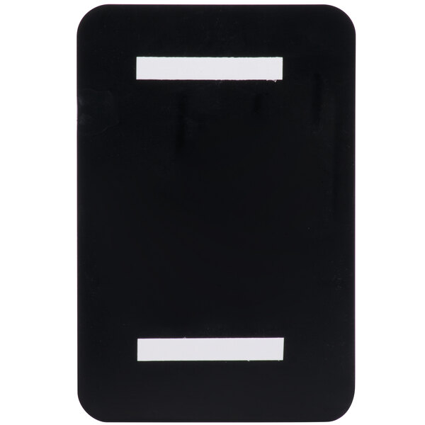 A black rectangular sign with white rectangles reading "Men" and "Restroom" with a white border and white braille lettering.