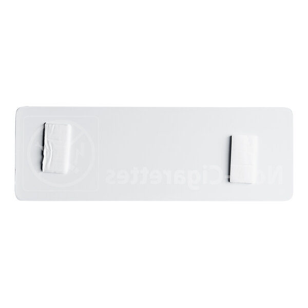 A white rectangular object with black text reading "No E-Cigarettes" and a black border.
