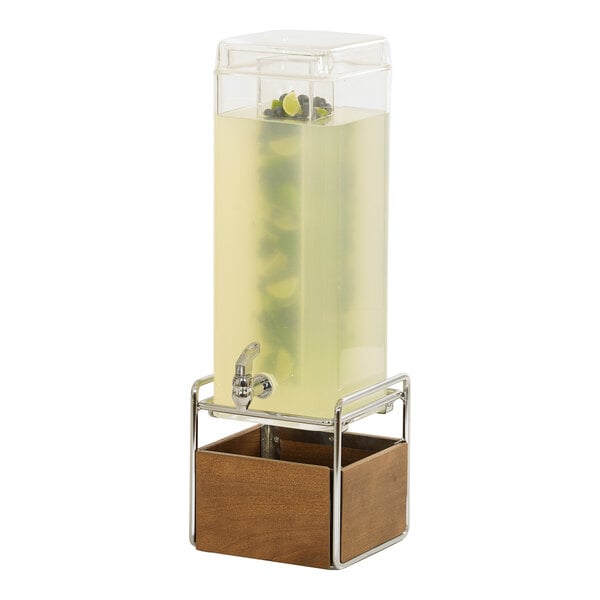 A Cal-Mil beverage dispenser with a wooden and chrome stand.