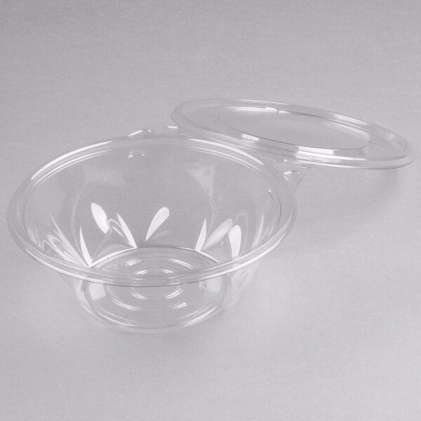 A Dart clear plastic container with a flat lid.
