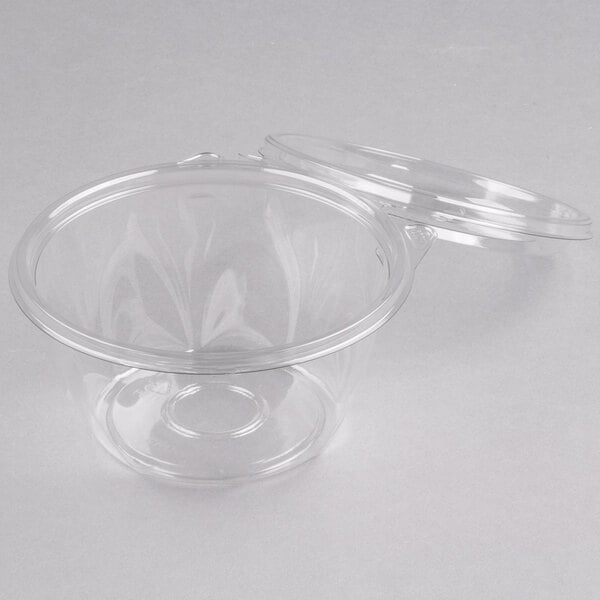 A Dart plastic bowl with a clear plastic lid.