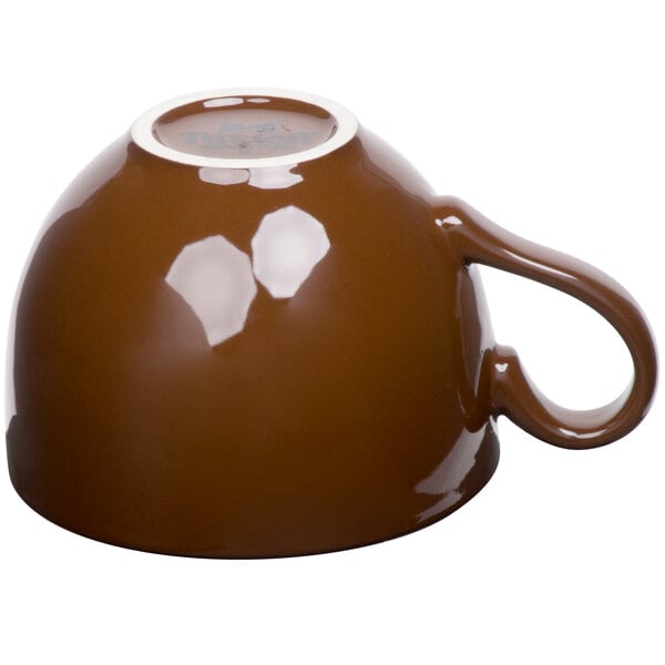 A mahogany brown Tuxton cappuccino cup with a handle.