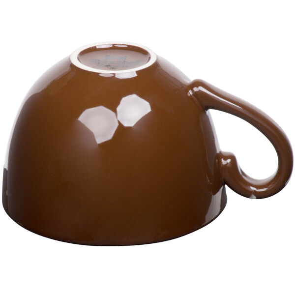 A mahogany Tuxton cappuccino cup with a handle.