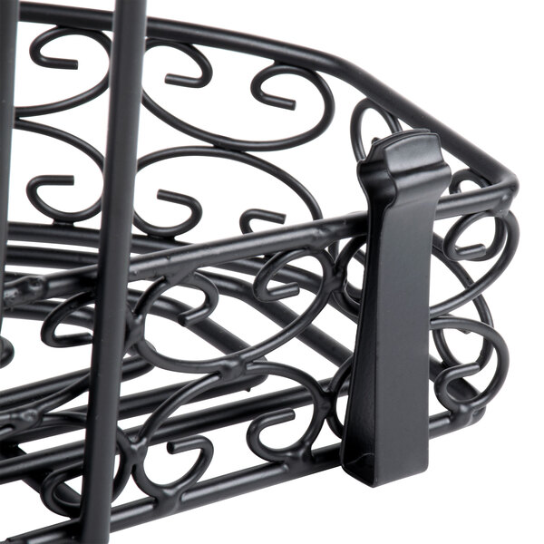 A Tablecraft black metal condiment caddy with a handle.