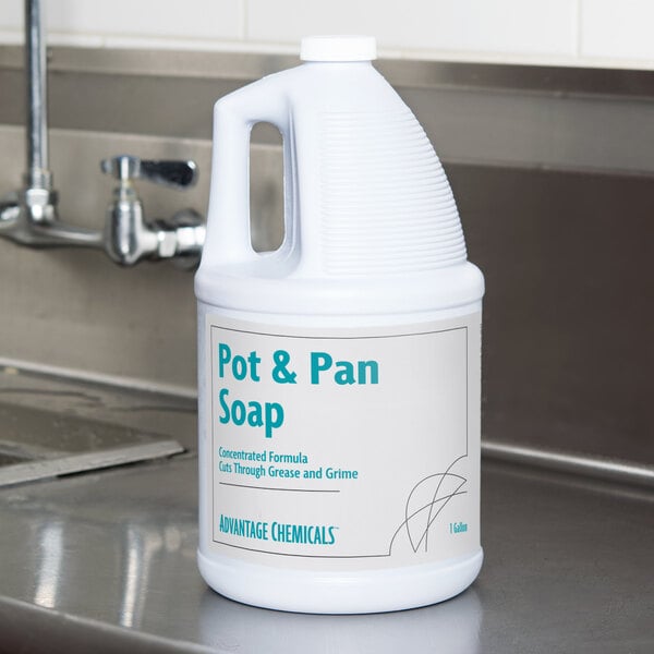 A white jug of Advantage Chemicals Concentrated Pot & Pan Liquid Detergent with a blue label.