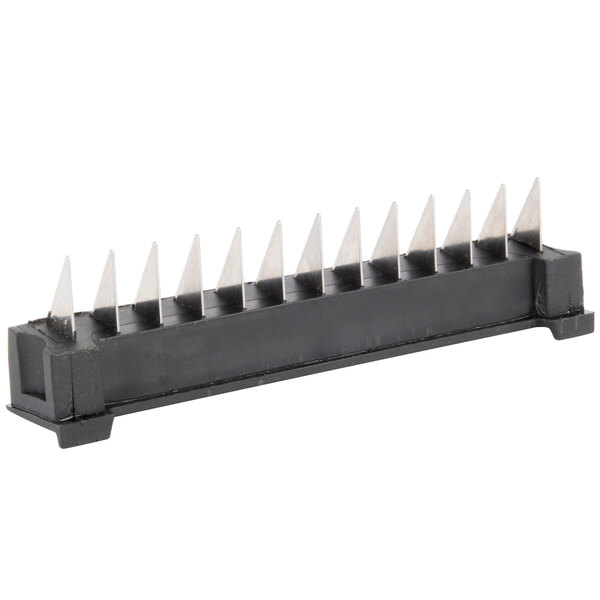 a black rectangular object with sharp spikes