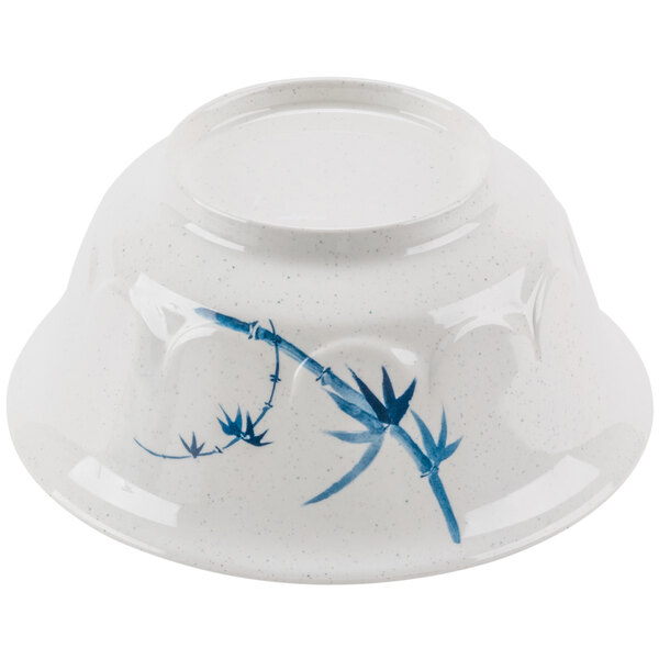 A white bowl with blue bamboo design.