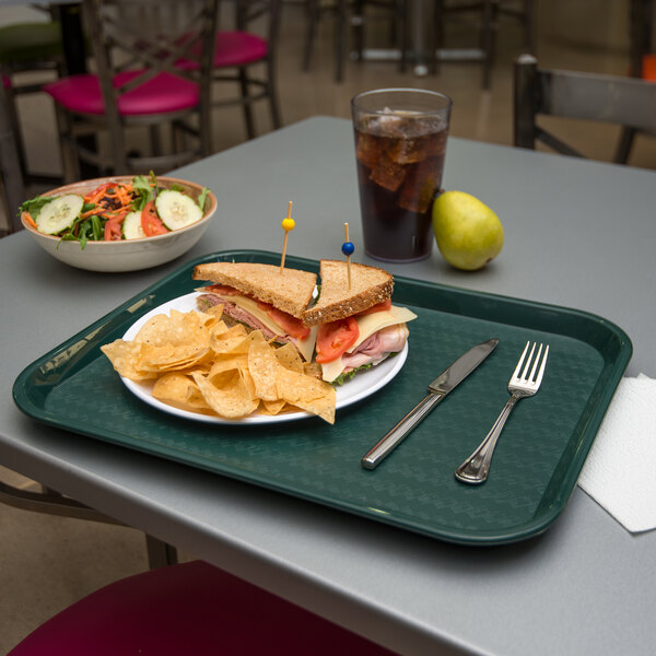 a sandwich with chips on a plate