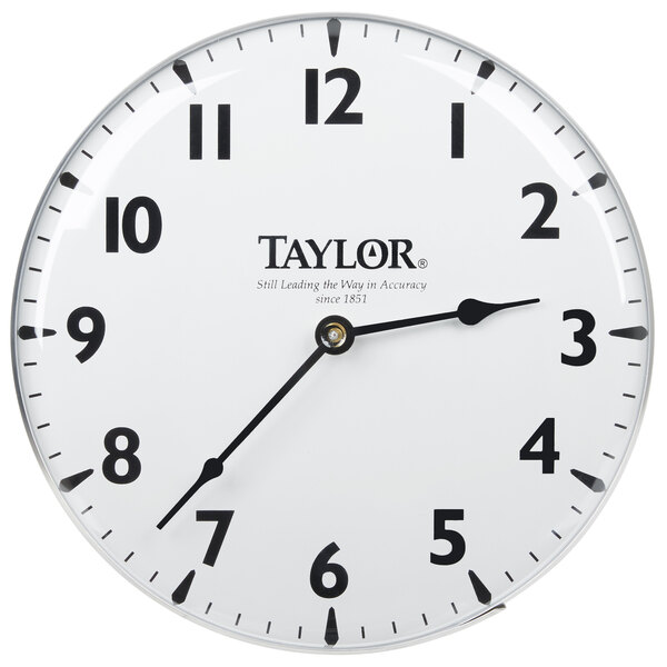 A white Taylor patio clock with black numbers on the face.