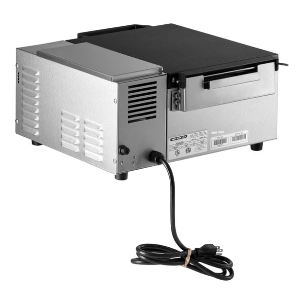 A Nemco Super Shot countertop steamer with a black lid and attached cord.