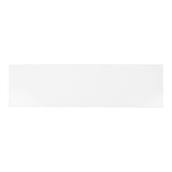A white rectangular cutting board with black lines.