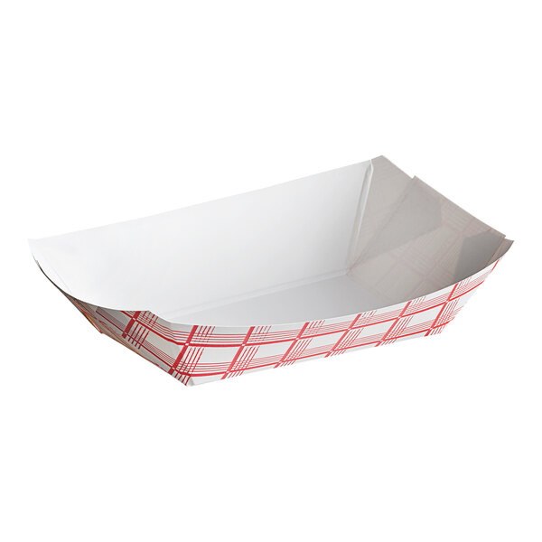 A white paper food tray with a red plaid pattern.
