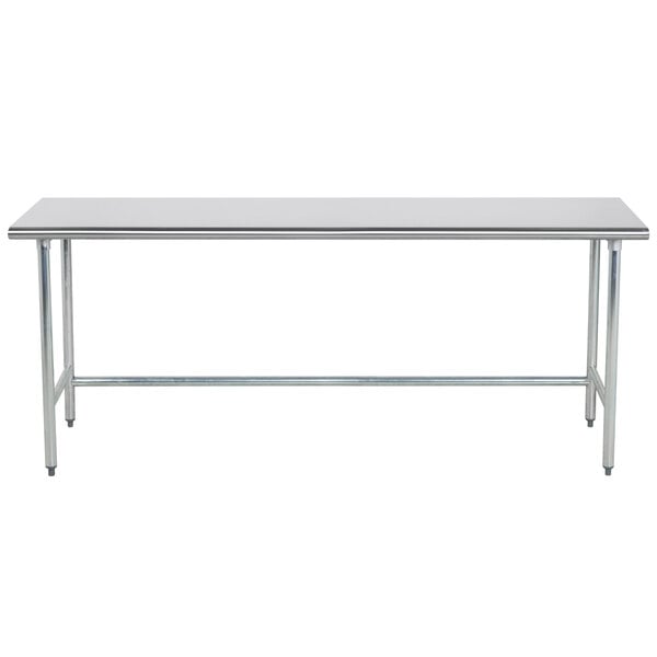 An Advance Tabco stainless steel work table with an open base and metal legs.