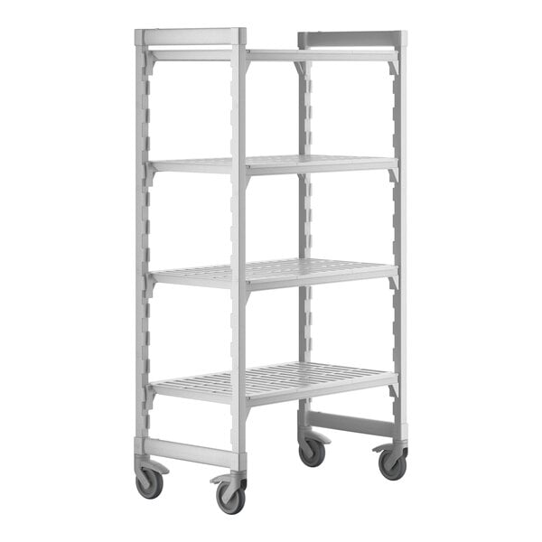 A white plastic Cambro Camshelving Premium mobile shelving unit with 4 shelves and wheels.