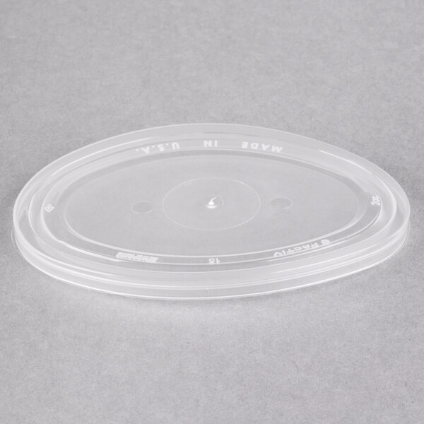 A clear plastic lid for Newspring black oval souffle cups.