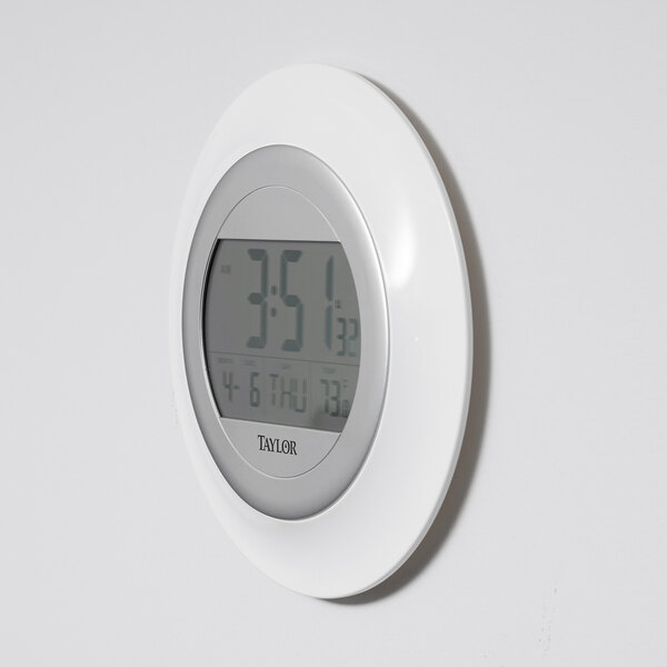 Taylor 1750 9 1/4" White Digital Atomic Wall Clock with Thermometer and