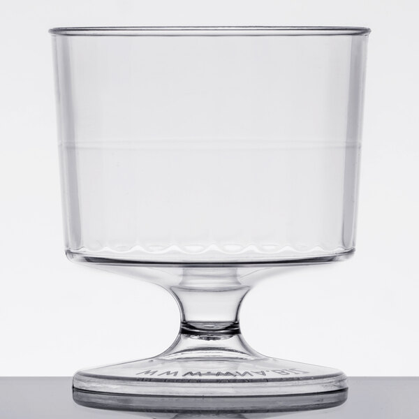 a clear glass with a small base