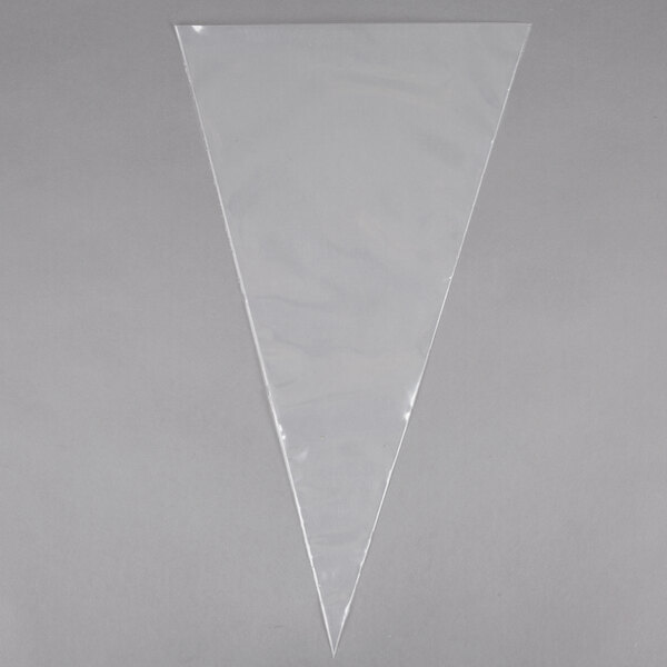 A clear plastic triangle pastry bag.