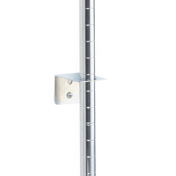 A stainless steel Metro wall mount post with a metal bracket.