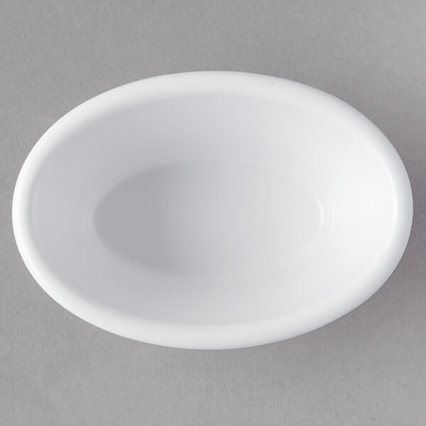 a white bowl on a gray surface