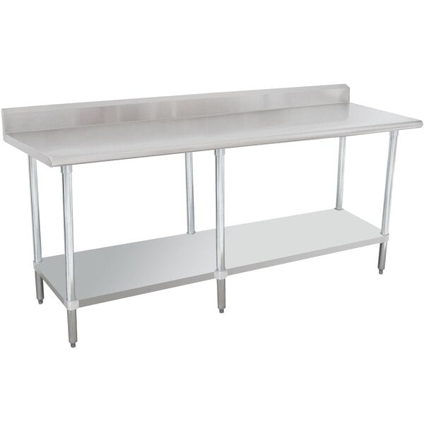 An Advance Tabco stainless steel work table with undershelf and backsplash.