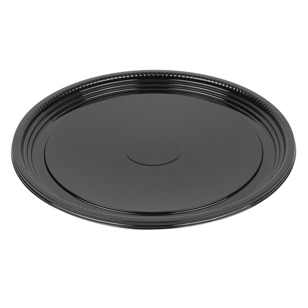 A black WNA Comet round catering tray with a round edge.