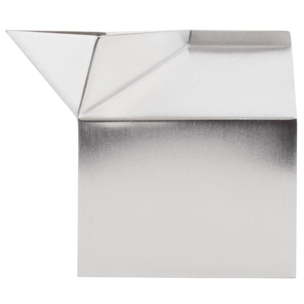 An American Metalcraft stainless steel milk carton creamer on a white surface with a black border.