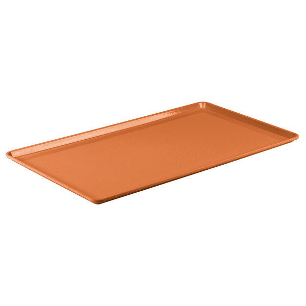 A close-up of a rectangular Cambro citrus orange dietary tray with a handle.