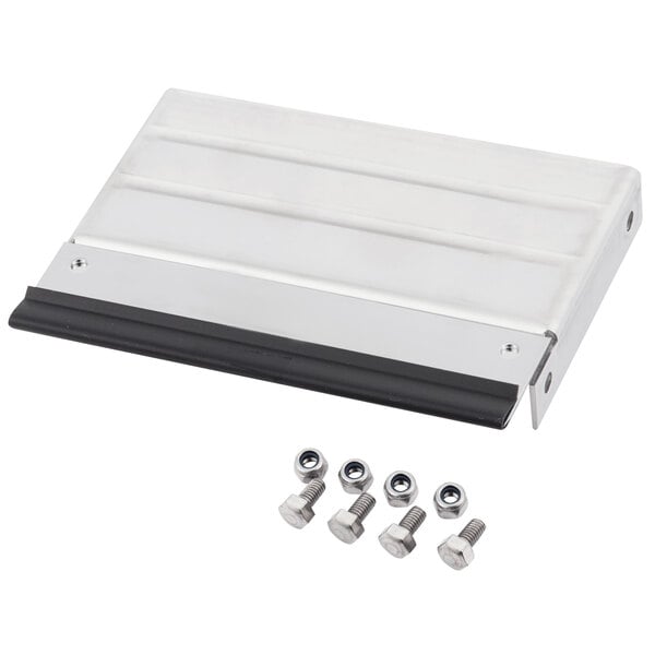 A silver rectangular Bron Coucke central blade with screws.