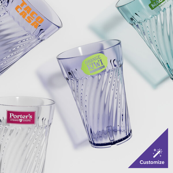 A close-up of a jade GET plastic tumbler with water.