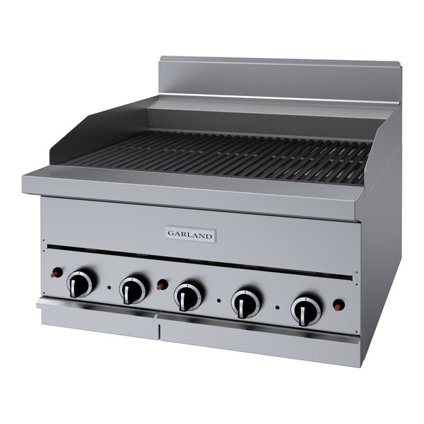 A stainless steel Garland liquid propane ceramic briquette charbroiler with knobs and a handle.