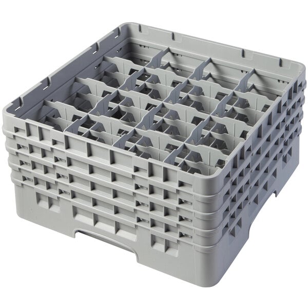 A large grey plastic Cambro glass rack with 16 compartments and extenders.