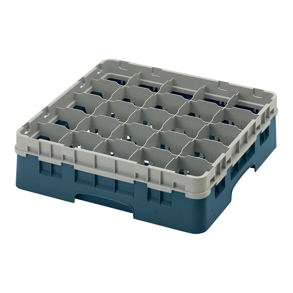 A teal plastic Cambro glass rack with many compartments.