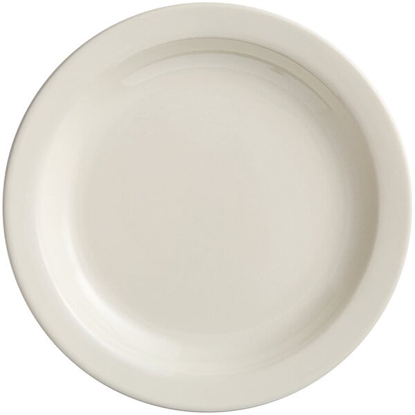 An Acopa ivory stoneware plate with a narrow white rim.