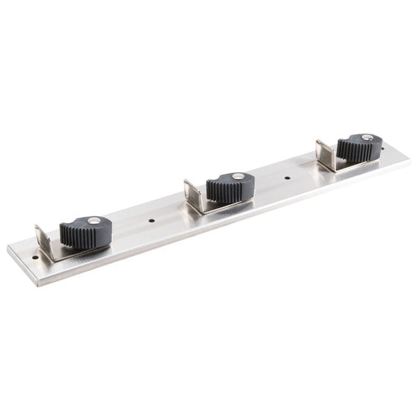 A stainless steel T&S mop hanger with black plastic clips.