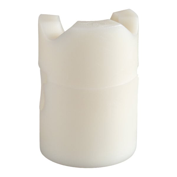 A white cylindrical plastic component with two notches on the top edge.