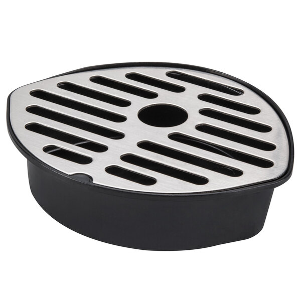 A black and silver Bunn single cup coffee maker with a white drain cover with holes.