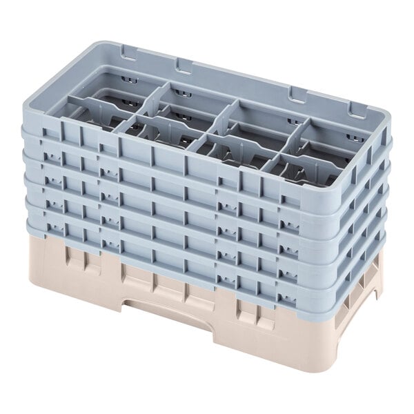 A beige plastic Cambro glass rack with six compartments.