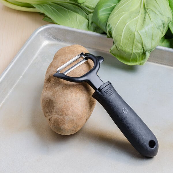 hand held potato peeler