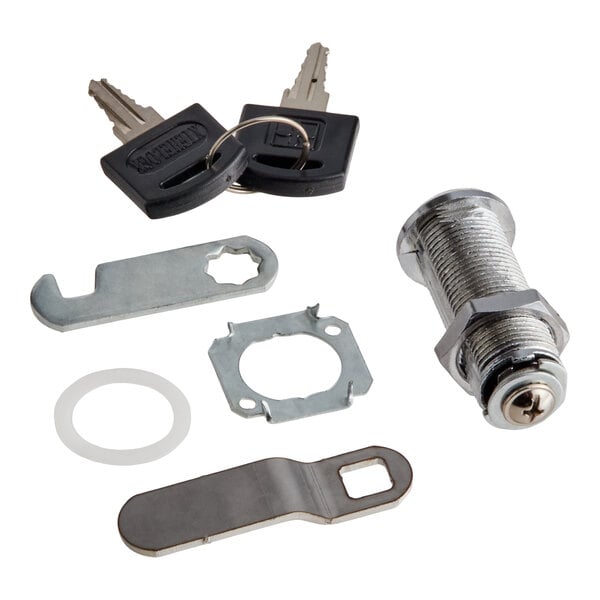 A set of metal lock components and two keys, including a cylindrical lock, flat metal plates, a washer, and a key ring.