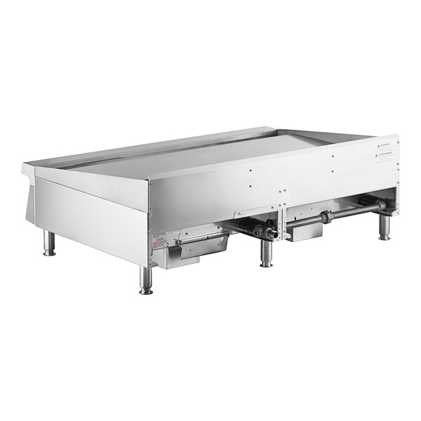 A Garland natural gas countertop griddle with thermostatic controls.