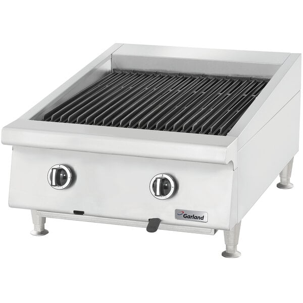 A Garland natural gas charbroiler on a counter.