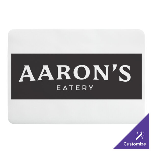 A customizable white paper placemat with rounded corners featuring a black rectangular area for text.