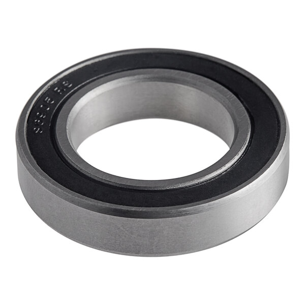 A close up of a Manitowoc Ice lower bearing with a black rubber ring.