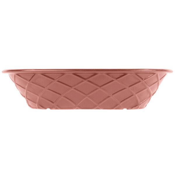 A pink oval weave basket with a patterned design.