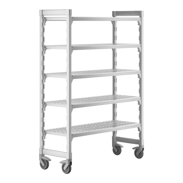 A white metal Camshelving® Premium mobile shelving unit with four shelves on wheels.