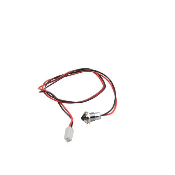A close-up of a blue indicator lens with a small wire and connector.